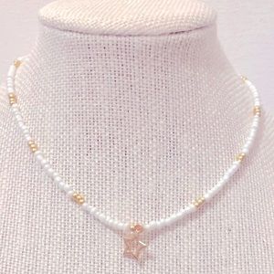 Gold star beaded necklace